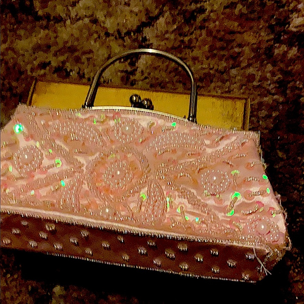 This is a woman or teenager make up bag.